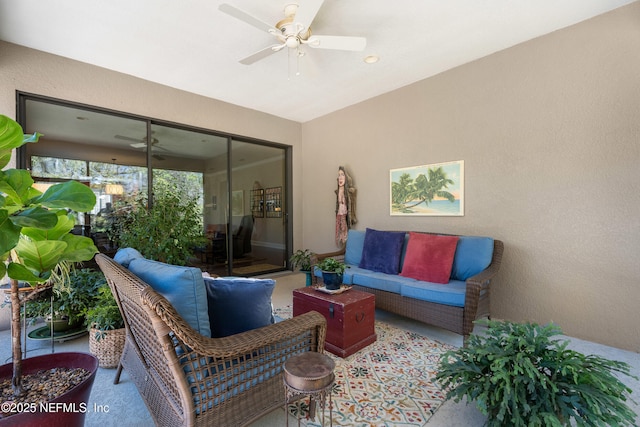 view of patio with an outdoor hangout area and a ceiling fan