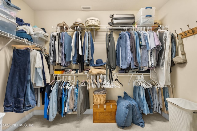 walk in closet with carpet flooring and visible vents