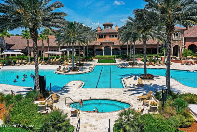 pool featuring a patio area