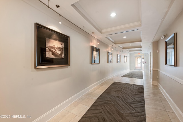 525 3rd St N Unit 303, Jacksonville Beach, FL 32250 - hallway featuring light tile patterned floors, recessed lighting, a raised ceiling, ornamental molding, and baseboards