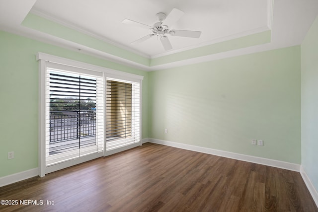 525 3rd St N Unit 303, Jacksonville Beach, FL 32250 - unfurnished room with wood finished floors, a raised ceiling, and baseboards
