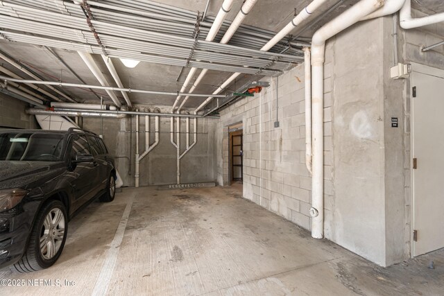 525 3rd St N Unit 303, Jacksonville Beach, FL 32250 - garage with concrete block wall