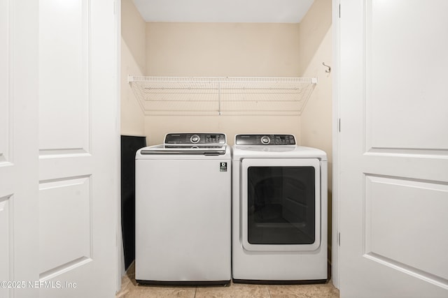 525 3rd St N Unit 303, Jacksonville Beach, FL 32250 - laundry area featuring laundry area and washer and dryer