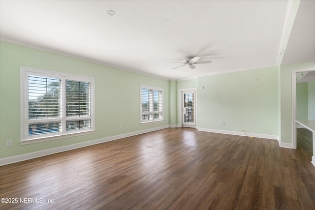 525 3rd St N Unit 303, Jacksonville Beach, FL 32250 - empty room with ceiling fan, baseboards, dark wood finished floors, and crown molding