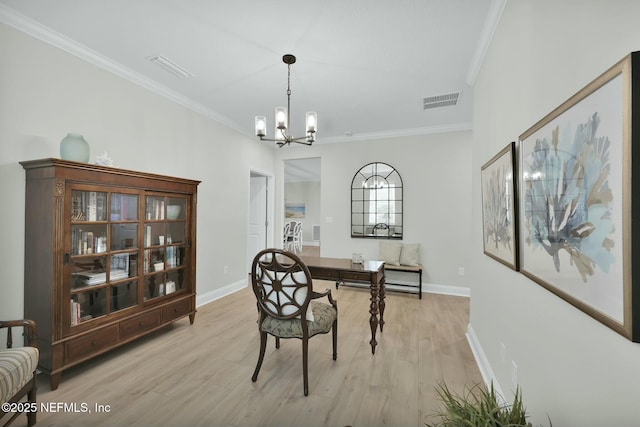 dining space featuring a chandelier, light wood-style flooring, visible vents, and crown molding