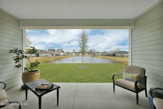 view of patio / terrace featuring a water view