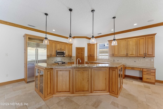 kitchen with visible vents, a spacious island, stainless steel appliances, crown molding, and tasteful backsplash