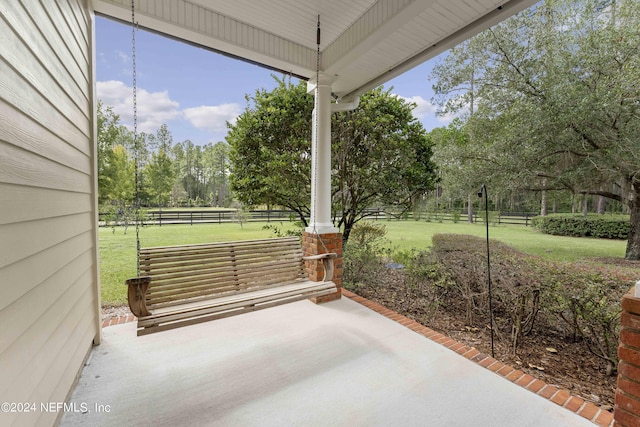 view of patio / terrace with fence