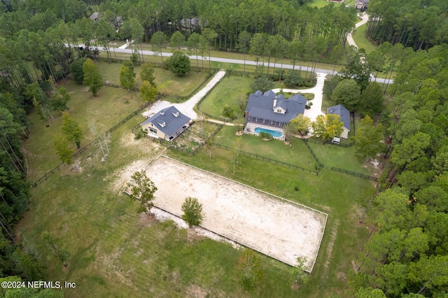 drone / aerial view with a rural view and a forest view