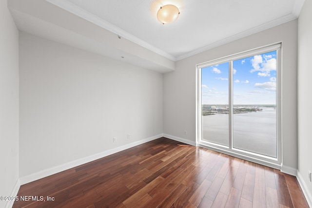 1431 Riverplace Blvd Unit 2606, Jacksonville, FL 32207 - spare room with a water view, crown molding, baseboards, and dark wood finished floors