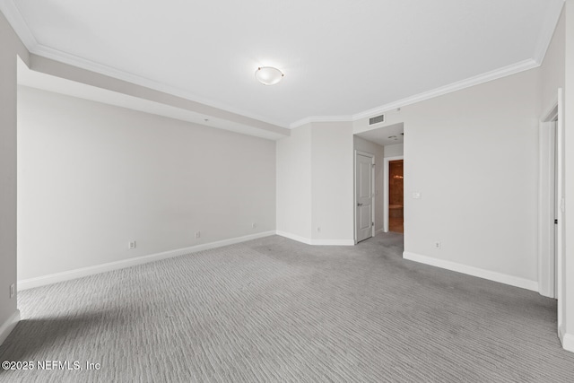 1431 Riverplace Blvd Unit 2606, Jacksonville, FL 32207 - carpeted spare room featuring baseboards, visible vents, and ornamental molding