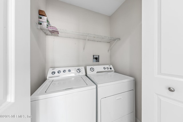 1431 Riverplace Blvd Unit 2606, Jacksonville, FL 32207 - washroom featuring independent washer and dryer and laundry area