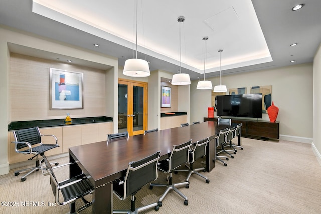 1431 Riverplace Blvd Unit 2606, Jacksonville, FL 32207 - office area with a tray ceiling, french doors, light carpet, baseboards, and recessed lighting