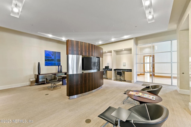 1431 Riverplace Blvd Unit 2606, Jacksonville, FL 32207 - workout room with baseboards and light carpet