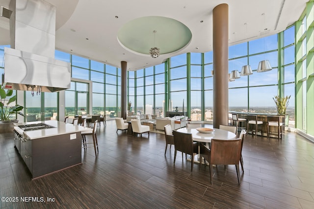 1431 Riverplace Blvd Unit 2606, Jacksonville, FL 32207 - dining room featuring a wall of windows and wood finish floors
