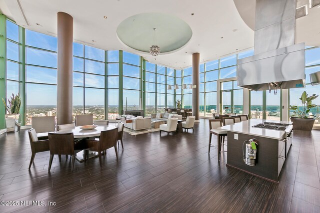 1431 Riverplace Blvd Unit 2606, Jacksonville, FL 32207 - dining area with expansive windows and wood tiled floor