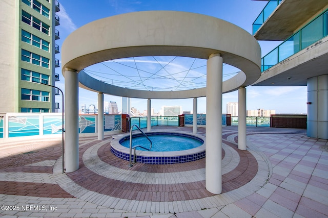 1431 Riverplace Blvd Unit 2606, Jacksonville, FL 32207 - view of swimming pool featuring a view of city and a community hot tub