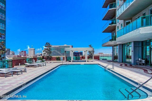 1431 Riverplace Blvd Unit 2606, Jacksonville, FL 32207 - community pool with a view of city and a patio area
