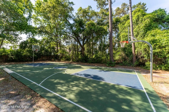 view of sport court featuring community basketball court and fence