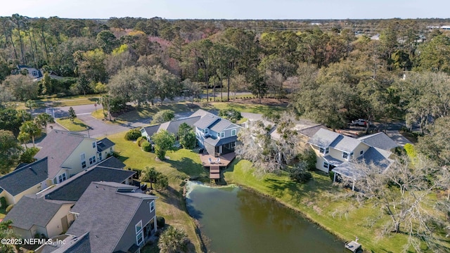 aerial view featuring a residential view and a forest view