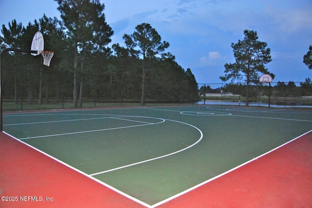 view of sport court with community basketball court and fence