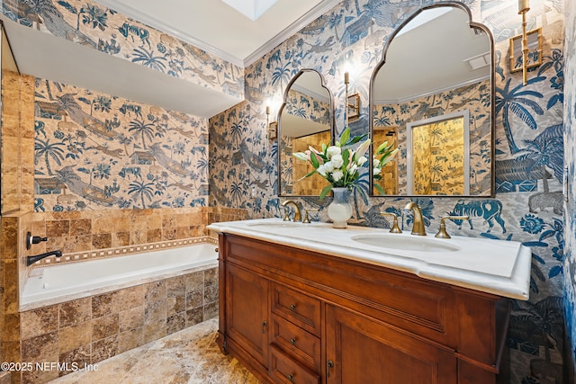 full bath with a bath, wallpapered walls, crown molding, and a sink