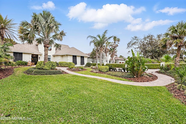 exterior space with a lawn