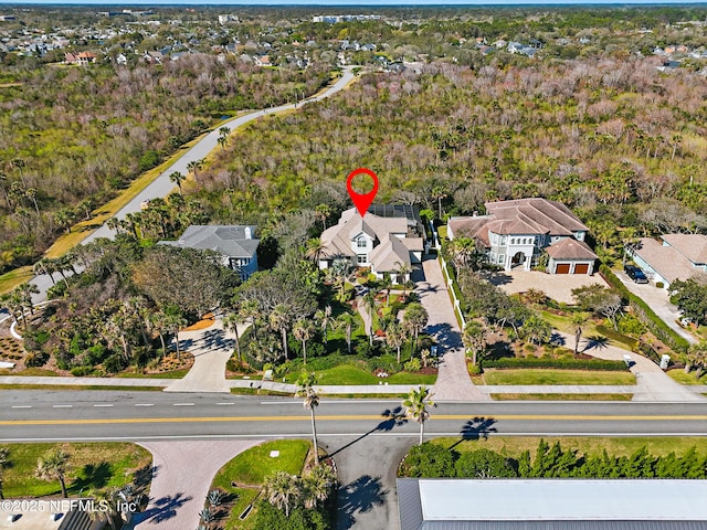 birds eye view of property with a residential view