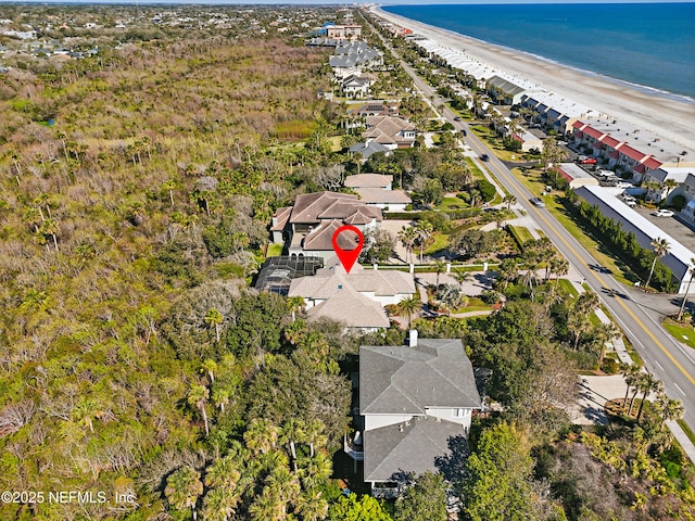 aerial view featuring a view of the beach and a water view