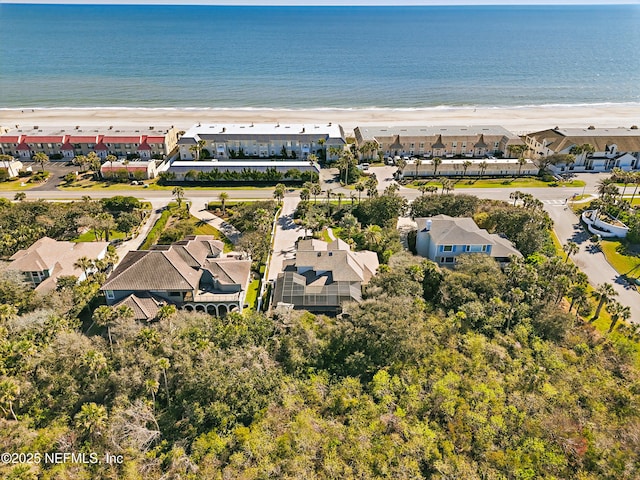 bird's eye view featuring a residential view and a beach view