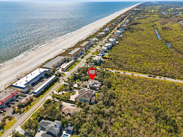 aerial view with a view of the beach and a water view