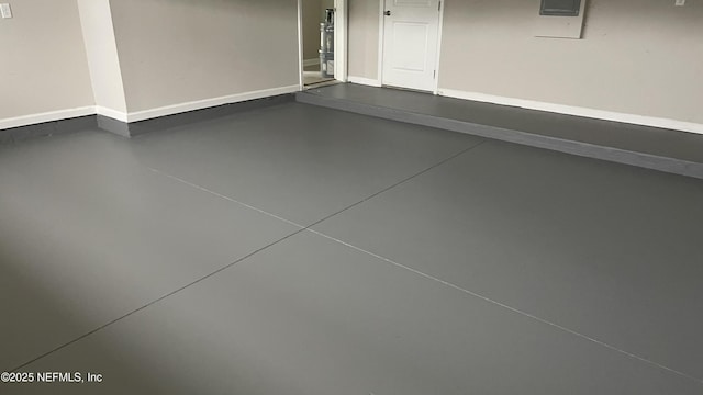 garage with baseboards