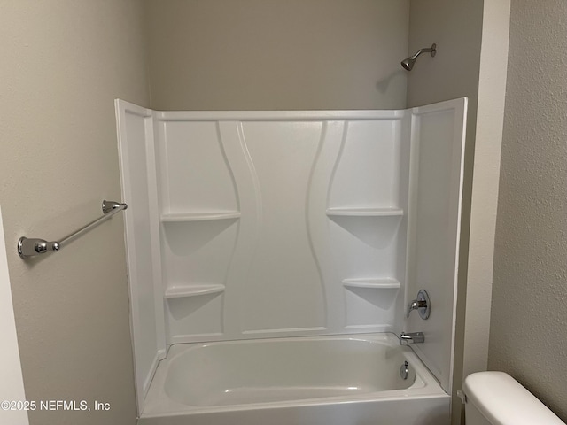 full bath with toilet and  shower combination