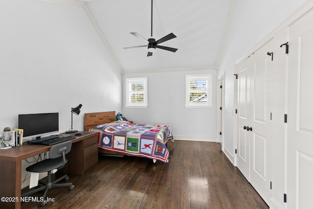 bedroom featuring baseboards, ceiling fan, hardwood / wood-style flooring, vaulted ceiling, and crown molding