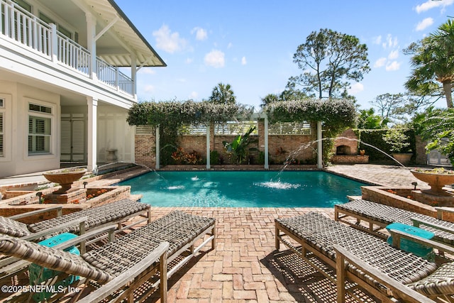 view of pool featuring a patio, a fenced in pool, and a fenced backyard