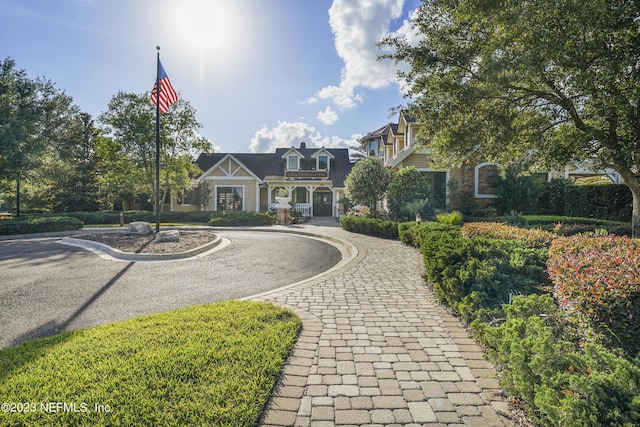 view of front of property with decorative driveway