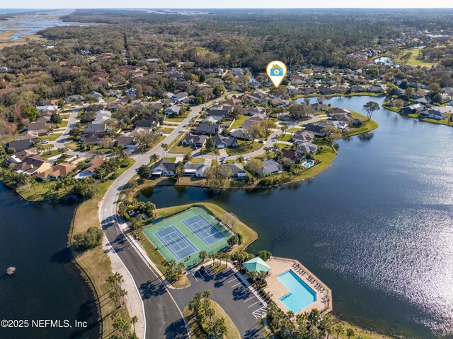 aerial view with a residential view and a water view