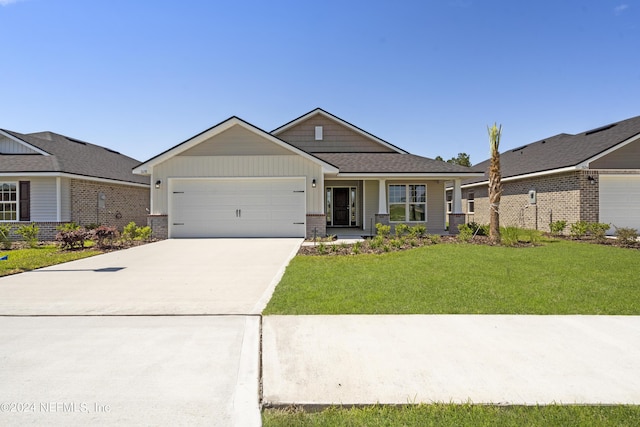 view of front facade with an attached garage, brick siding, concrete driveway, a front lawn, and board and batten siding