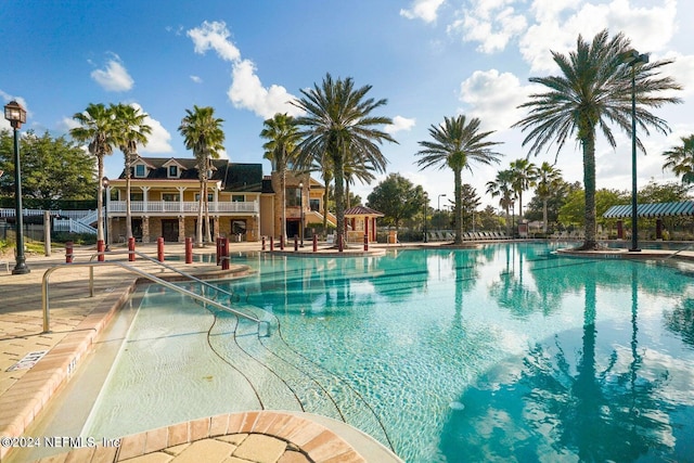 pool with a patio