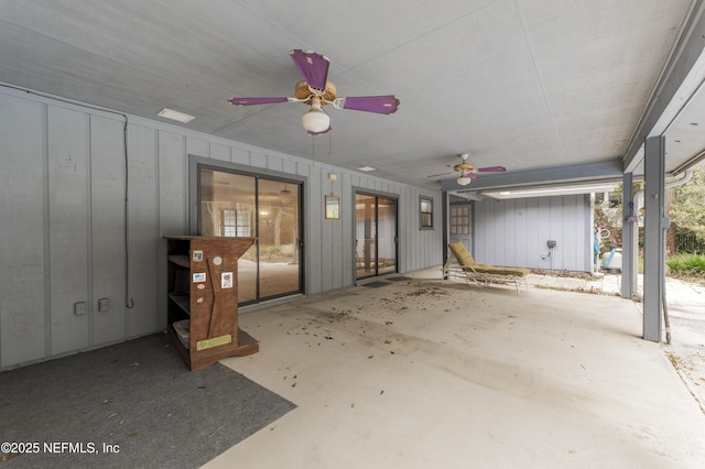 view of patio featuring ceiling fan