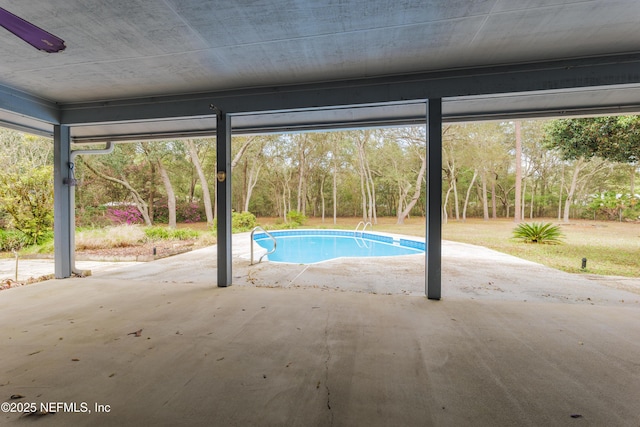 outdoor pool with a patio