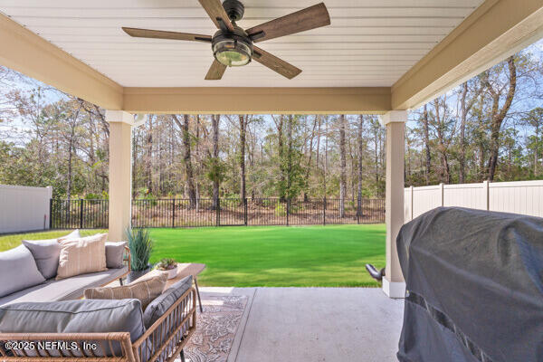 view of patio / terrace featuring outdoor lounge area, a ceiling fan, a fenced backyard, and a grill