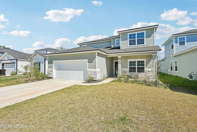 view of front of home with a front lawn, a garage, stone siding, and driveway