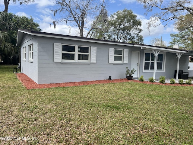 ranch-style home with a front yard