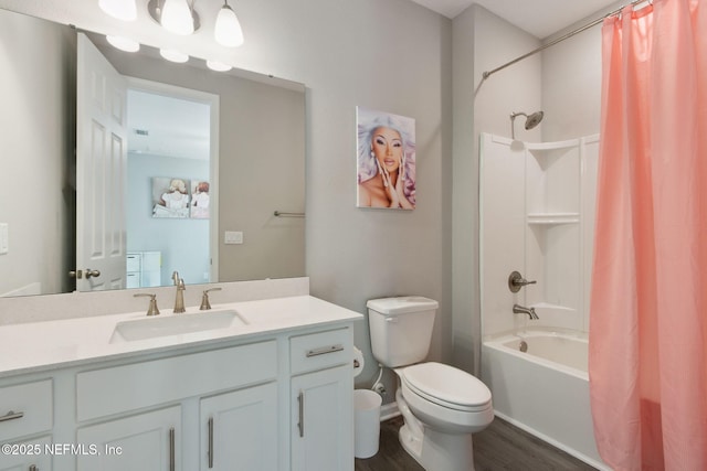 full bath featuring shower / tub combo, vanity, toilet, and wood finished floors