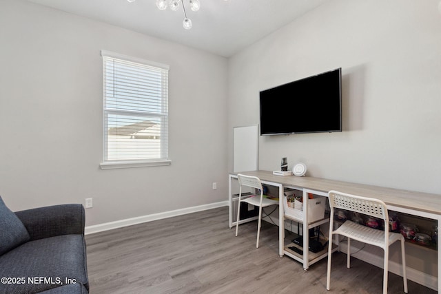 office featuring wood finished floors and baseboards