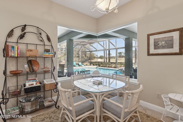 861998 N Hampton Club Way, Fernandina Beach, FL 32034 - dining area with plenty of natural light, baseboards, and a sunroom