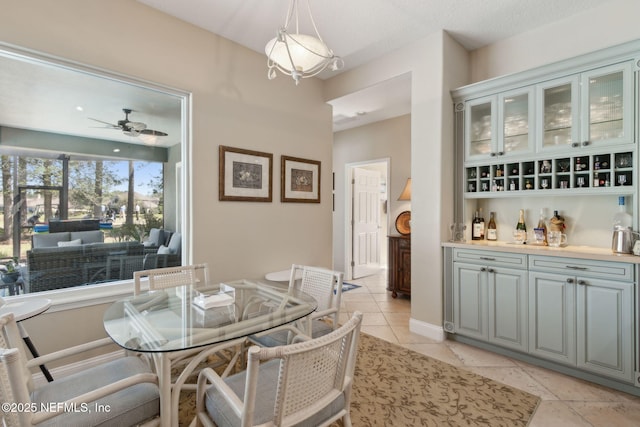 861998 N Hampton Club Way, Fernandina Beach, FL 32034 - dining space featuring light tile patterned flooring, baseboards, and a ceiling fan