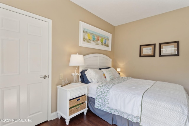 861998 N Hampton Club Way, Fernandina Beach, FL 32034 - bedroom with baseboards and dark wood finished floors