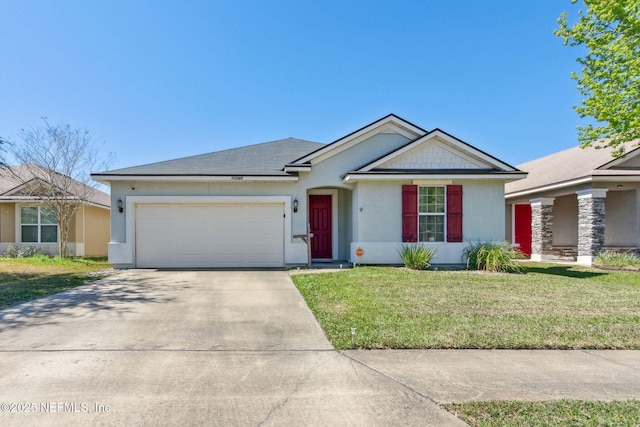 single story home with an attached garage, driveway, and a front yard